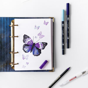 Bullet Journal mit illustriertem Schmetterling